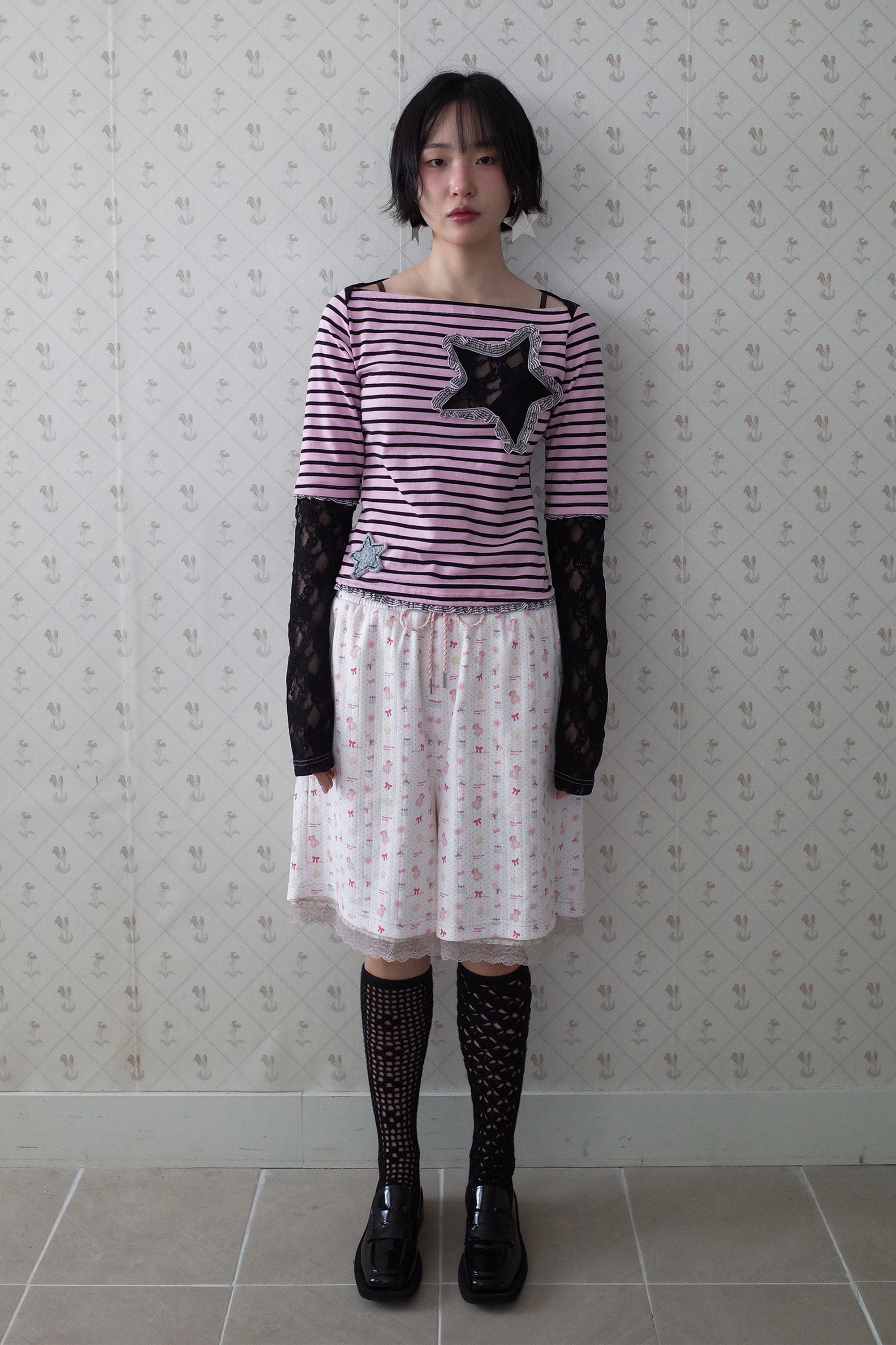 Collaged stripe star top black